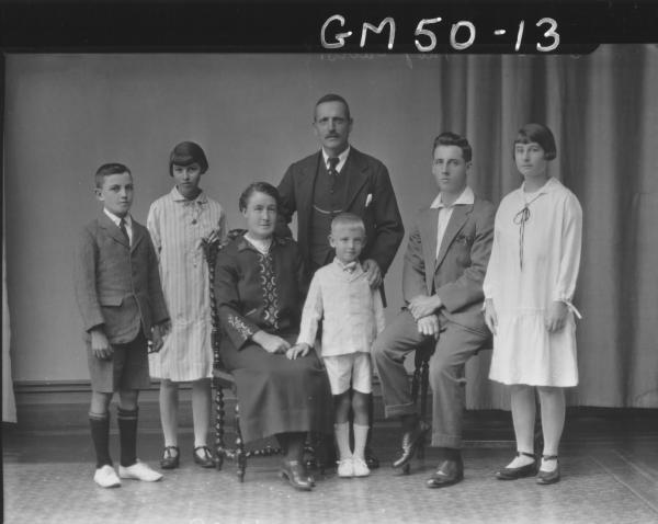 portrait of woman, man and five children, F/L Ford