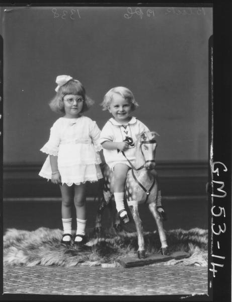 PORTRAIT OF TWO CHILDREN AND ROCKING HORSE, F/L BLACK