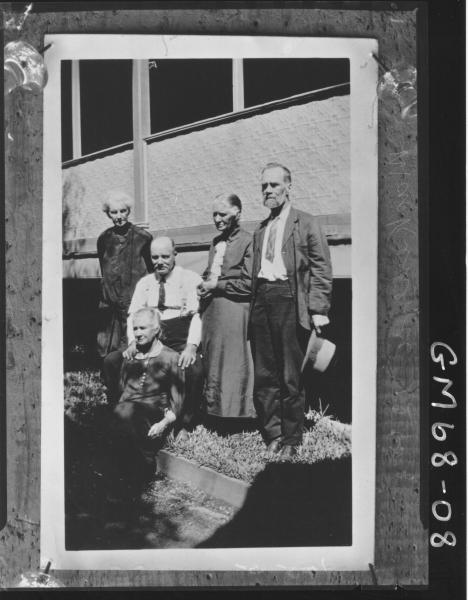 FIVE ELDERLY PEOPLE OUTSIDE HOUSE, MACKENZIE