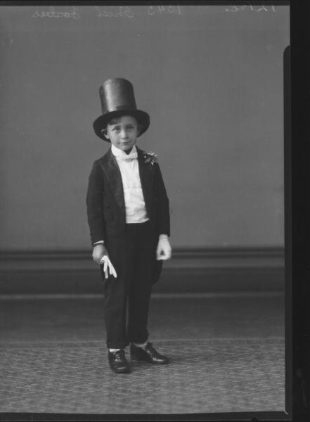 PORTRAIT OF BOY WEARING FANCY DRESS COSTUME, O'NIEL