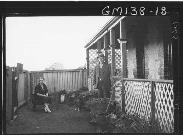 Man and woman outside house 'Martin'