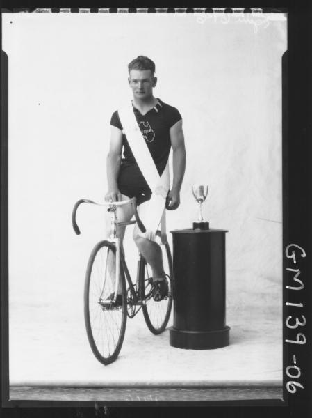 Portrait of cyclist with bike and cup 'Egan'