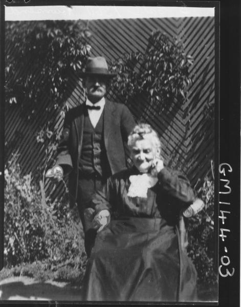 Copy of old man and woman outside house 'Townsend'