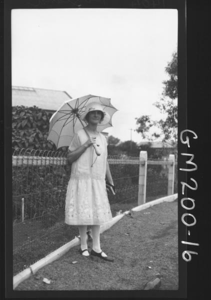 Woman outside house 'Boyland'