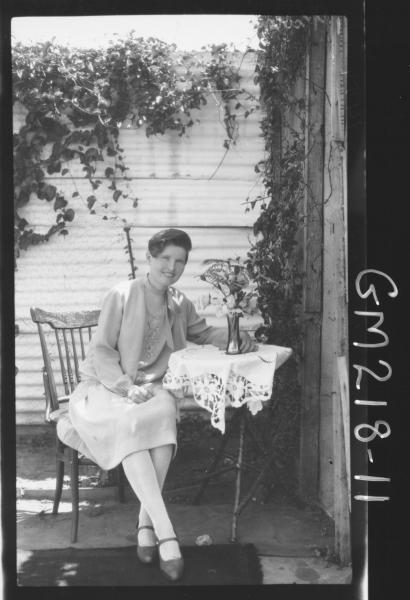 Portrait of woman on verandah 'Hosbach'