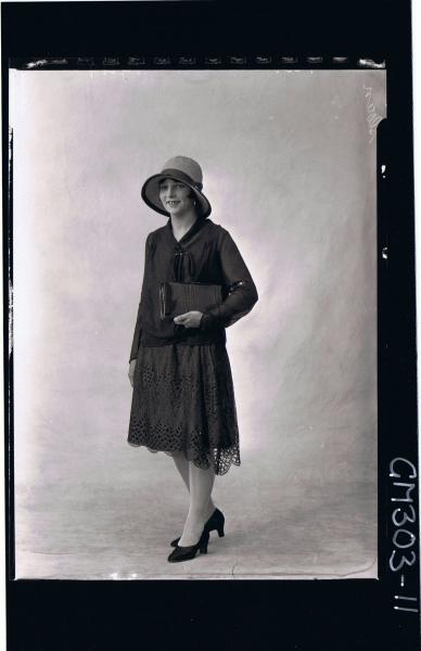 1/2 Portrait of elderly woman wearing day dress; 'Mathews' (passport)
