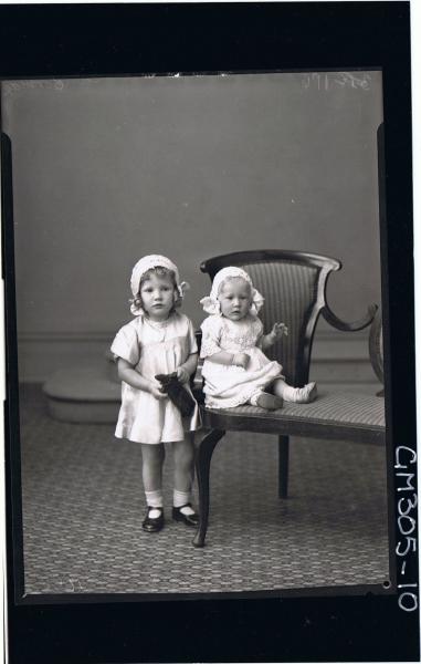 F/L Portrait of baby seated wearing a lace dress and hat, girl child standing wearing short dress & lace hat,'McCormack'