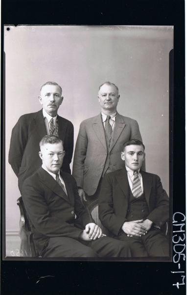 3/4 Group Portrait of two men seated, two men standing, all wearing suits; 'Malling'