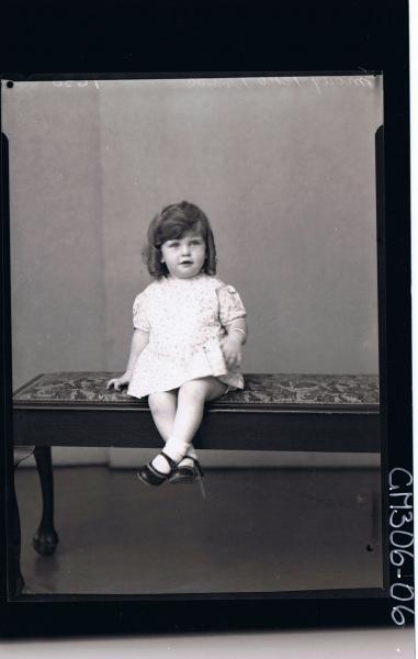 F/L Portrait of girl child seated, wearing short dress; 'Morey'