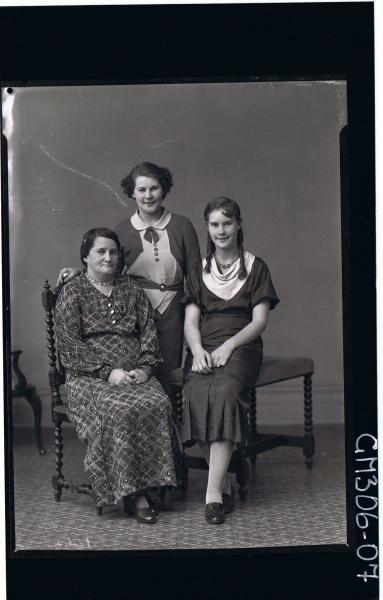F/L Portrait of elderly woman seated, teenage girl seated wearing 3/4 length pleated dress, young woman standing; 'Mohr' see 306-11