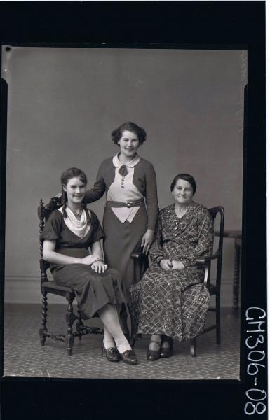 F/L Portrait of elderly woman seated wearing long dress,teenage girl seated,young woman standing,wearing 3/4 dress'Mohr'