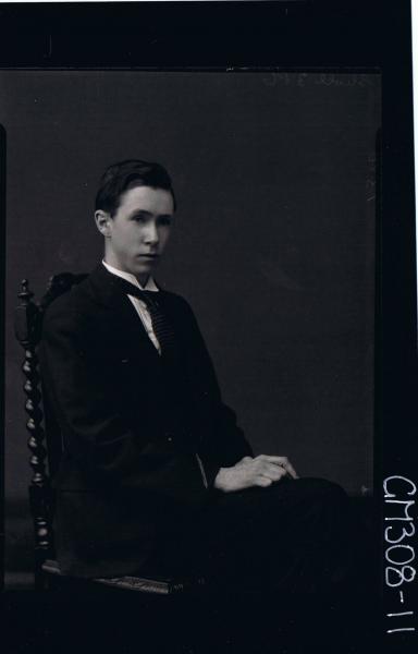 3/4 Portrait of man seated wearing three piece suit; 'Sholl'