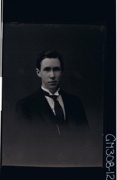 H/S Portrait of man wearing shirt, tie, jacket; 'Sholl'