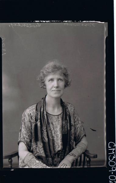 1/2 Portrait of woman seated wearing day dress, patterned scarf and gloves. (passport) 'Sweeney'