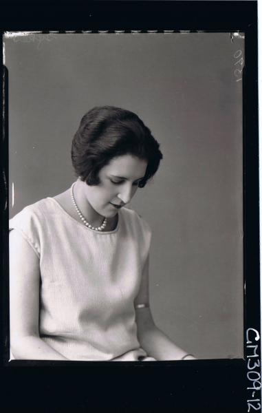 1/2 Portrait of woman wearing pearls; 'Sykes'