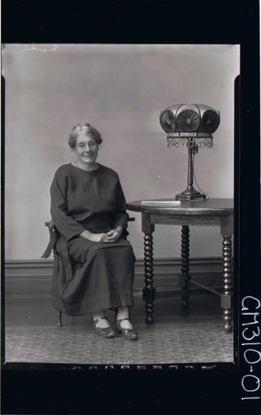 F/L Portrait of elderly woman seated, wearing a long dress; 'Martin'