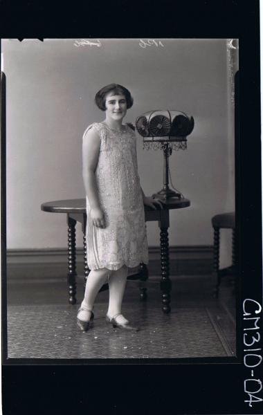 F/L Portrait of woman standing wearing knee length dress; 'Martin'