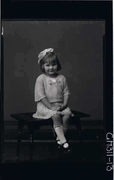 F/L Portrait of girl seated wearing short crochet dress, ribbon in hair 'Thornbury'