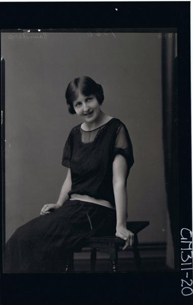 1/2 Portrait of woman seated wearing dress with sash round hips 'Saunders'