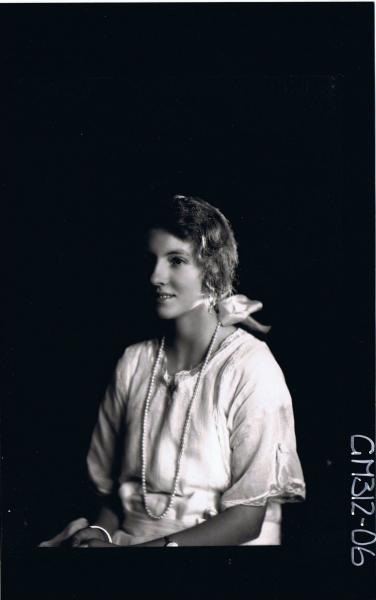 1/2 Portrait of woman seated wearing string of pearls, ribbon in hair 'Winter'