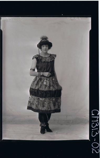 F/L Portrait of woman standing, wearing fancy dress costume 'Smith'
