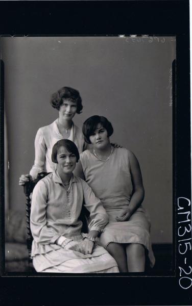 3/4 Portrait of woman seated, wearing dress,gloves, woman seated, woman standing in rear 'McGuire'