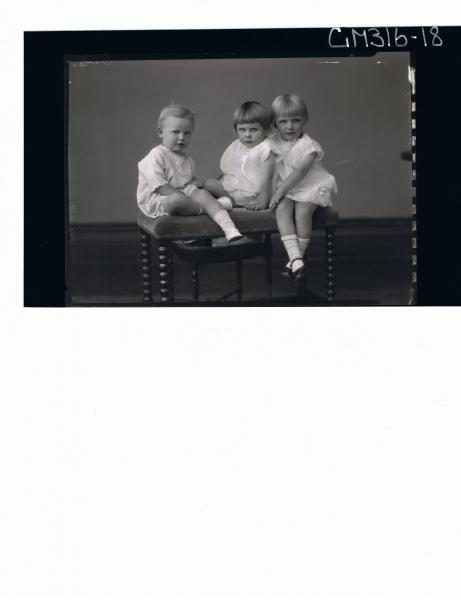 F/L Portrait of 3 children, 2 girls seated wearing short dresses, boy seated wearing one piece shorts & top 'Mulcahy'