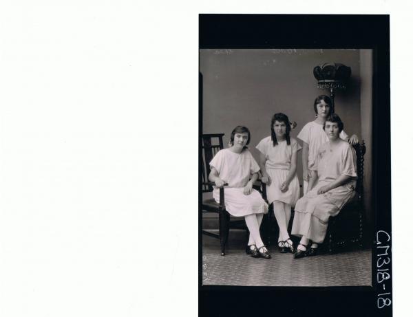 F/L Portrait of woman seated wearing ankle length dress with 3 tiers, two teenage girls seated, ribbons in hair 'Shea'