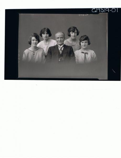 H/S Portrait of man wearing three piece suit, four young women wearing day dress 'Shearne'