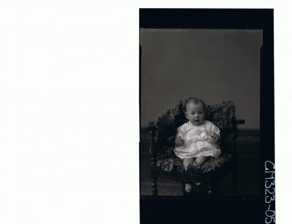 F/L Portrait of baby seated wearing lace dress; 'Plumer'