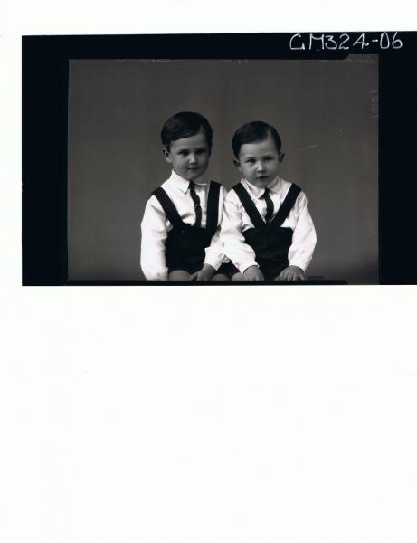 1/2 Portrait of 2 male children seated, wearing shirts, ties, shorts with braces; 'Lamont-Smith'