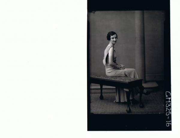 F/L Portrait of woman seated, wearing long evening dress; 'Lodding'