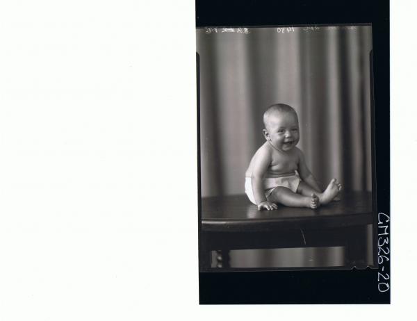 F/L Portrait of baby seated on table wearing pilchers; 'Slater'
