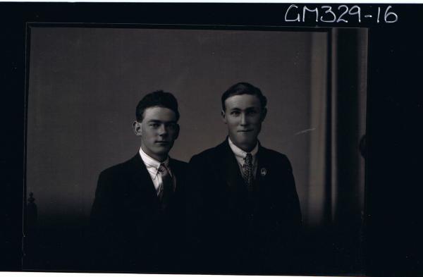 1/2 Portrait of two men wearing shirts, ties and jackets; 'Brennan'