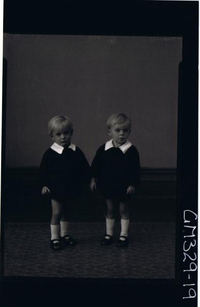F/L Portrait of two male children, seated, both wearing shorts and shirts; 'Morris'