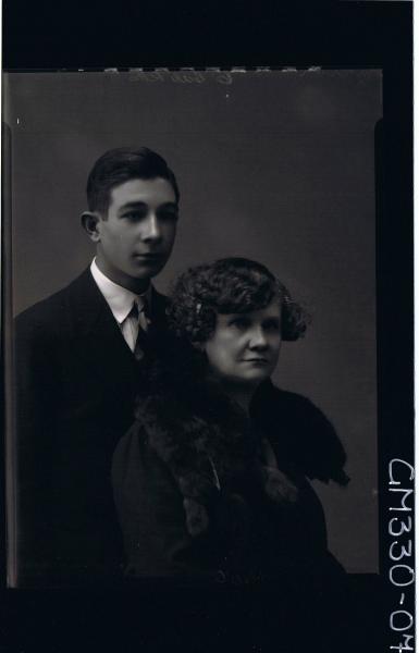 1/2 Portrait of woman wearing fur round shoulders, young man wearing suit; 'Ivor'