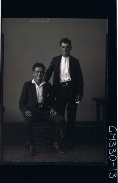 F/L Portrait of man seated wearing suit, man standing wearing suit; 'Mategovich'