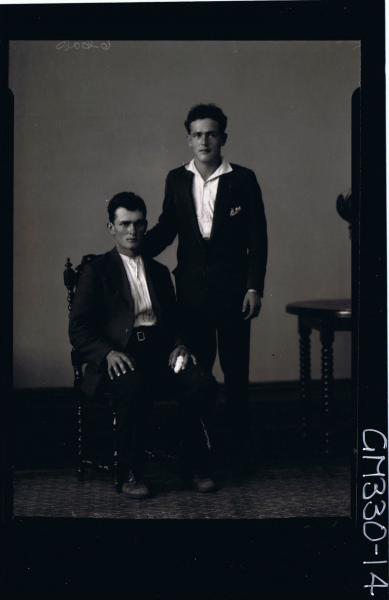 F/L Portrait of man seated wearing suit, man standing wearing suit; 'Mategovich'