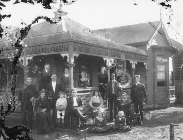 Family Group in front of house