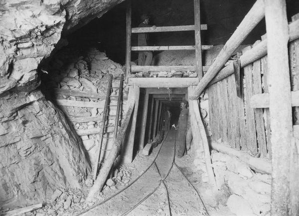 Oroya Brown Hill Mine Underground showing timbering and men.