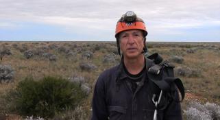 Clay Bryce talking to camera steamed from the Nullabor