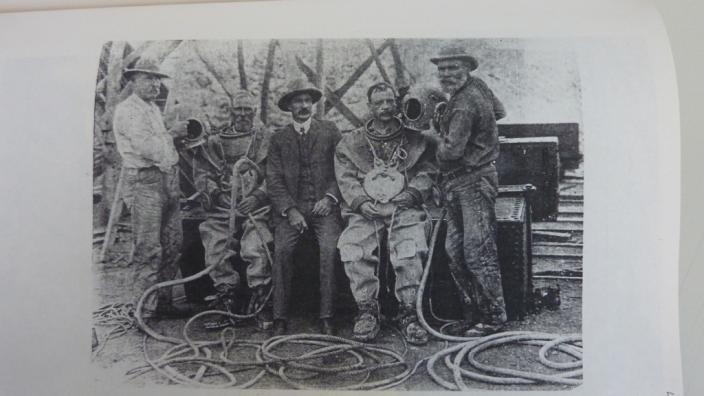 Divers Frank Hughes and Tom Hearne with their assistants and Josiah Crabb