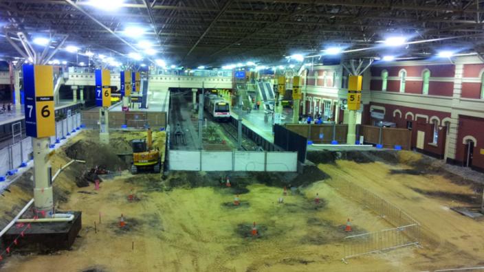 Colour photograph of railway station undergoing construction 