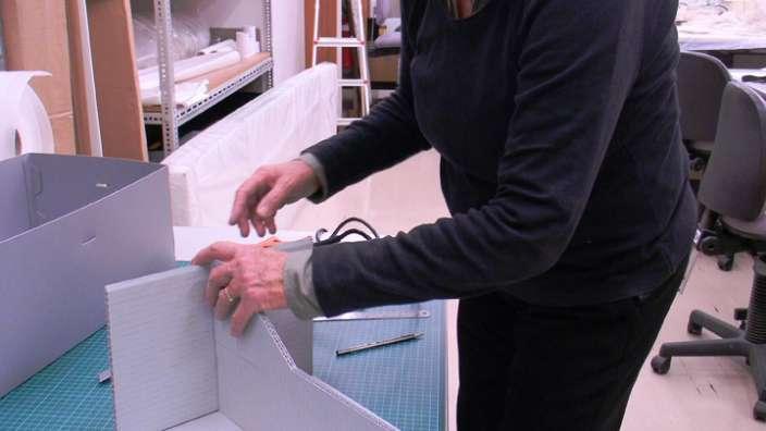 WA Museum Materials Conservation staff making an object box