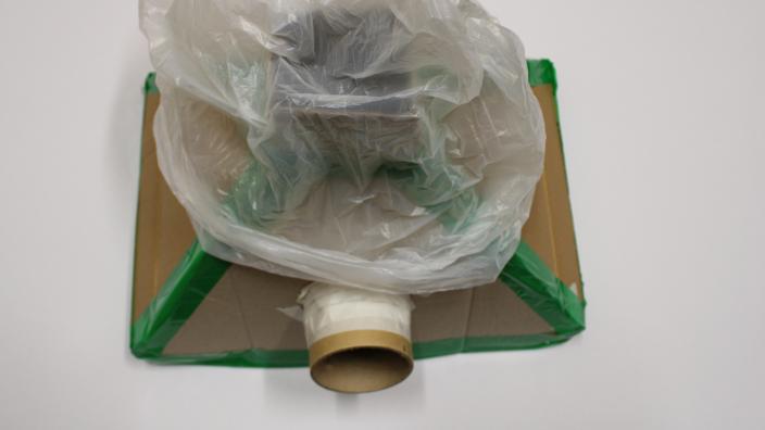 cardboard flue and bin bag