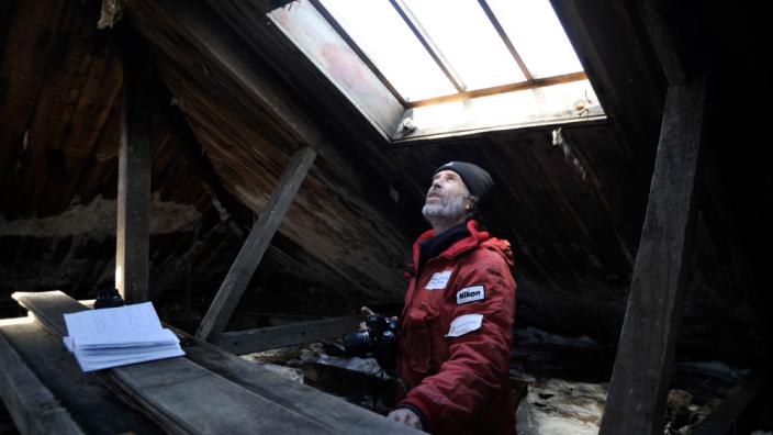 Dr Ian Godfrey inside the living quarters of the Main Hut in Antarctica