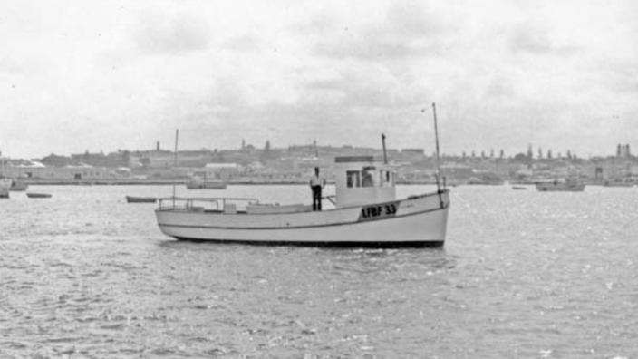 A small boat on a calm harbour