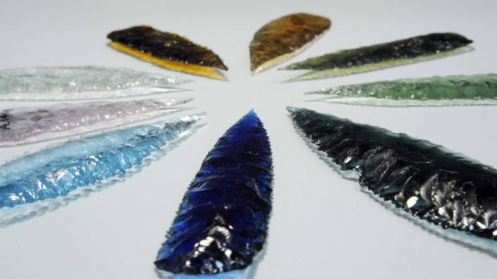 A series of colourful glass spear points