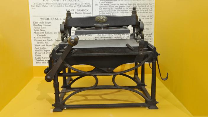 A large, old-style printing press