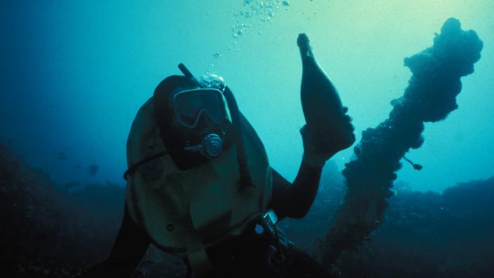 Divers discovering artefacts from the Sepia shipwreck site